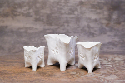 Porcelain Luminaries [triangular candle holders]