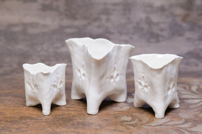 Porcelain Luminaries [triangular candle holders]